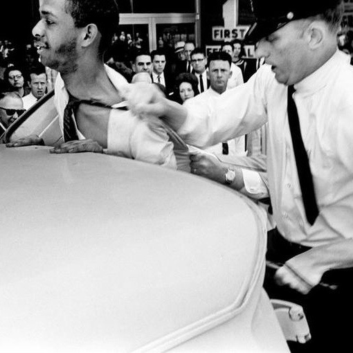 William Barbee being beaten by police