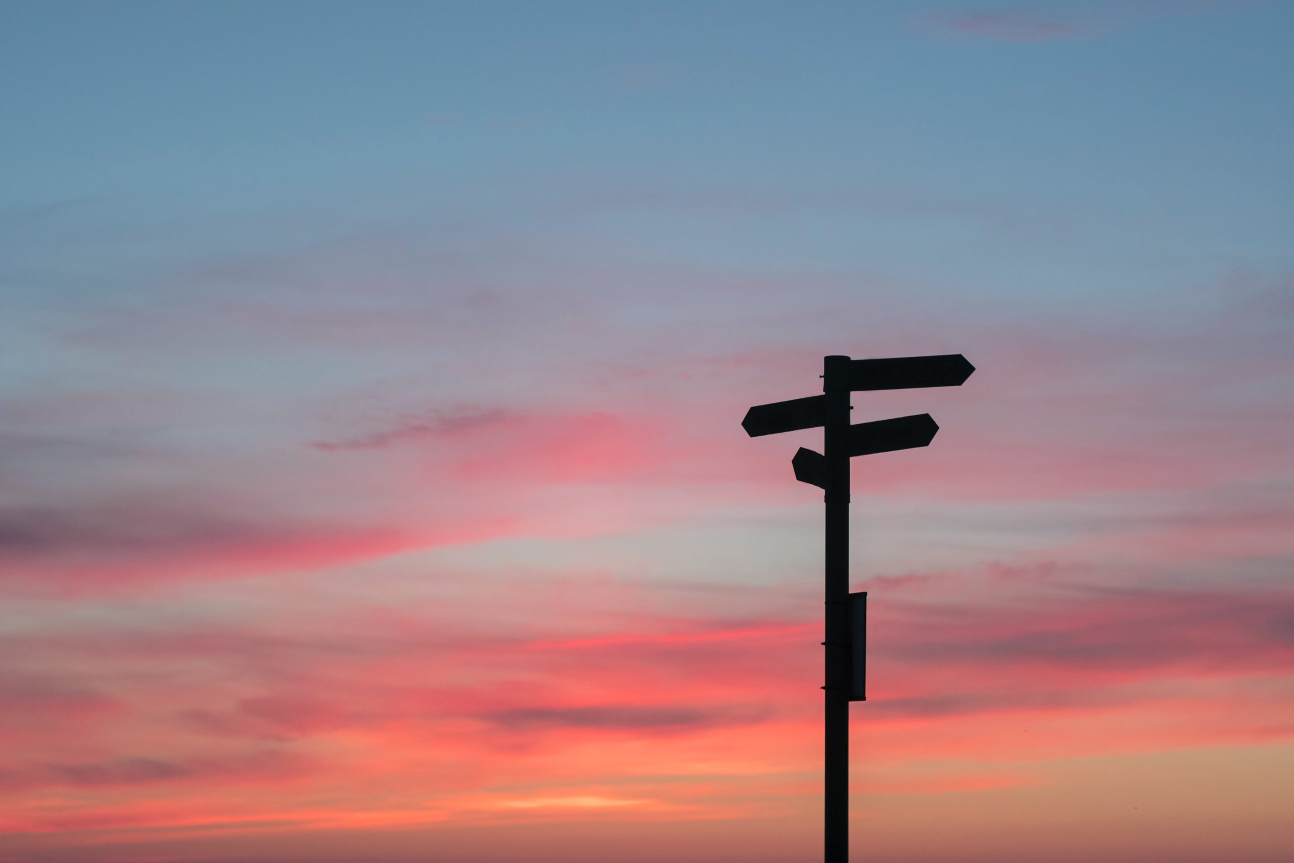 Crossroads sign at dusk