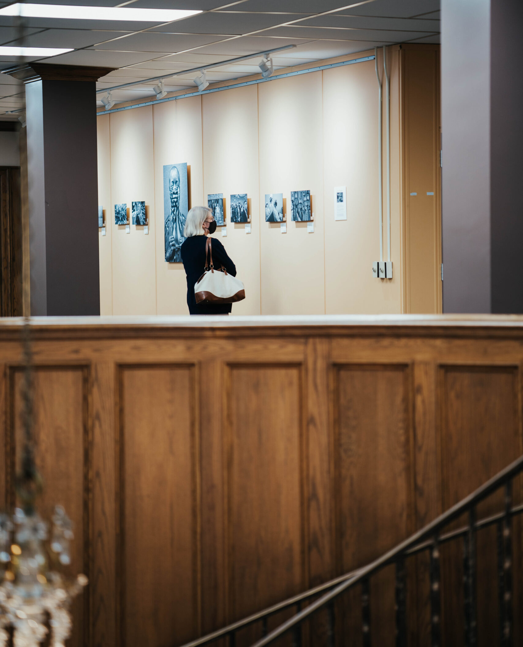 Woman looking at art in Laskey Gallery